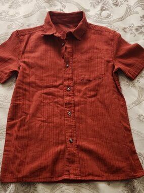 In great condition. Woven shirt.